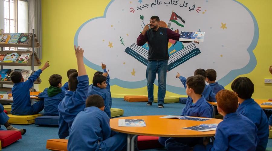 children reading in school library